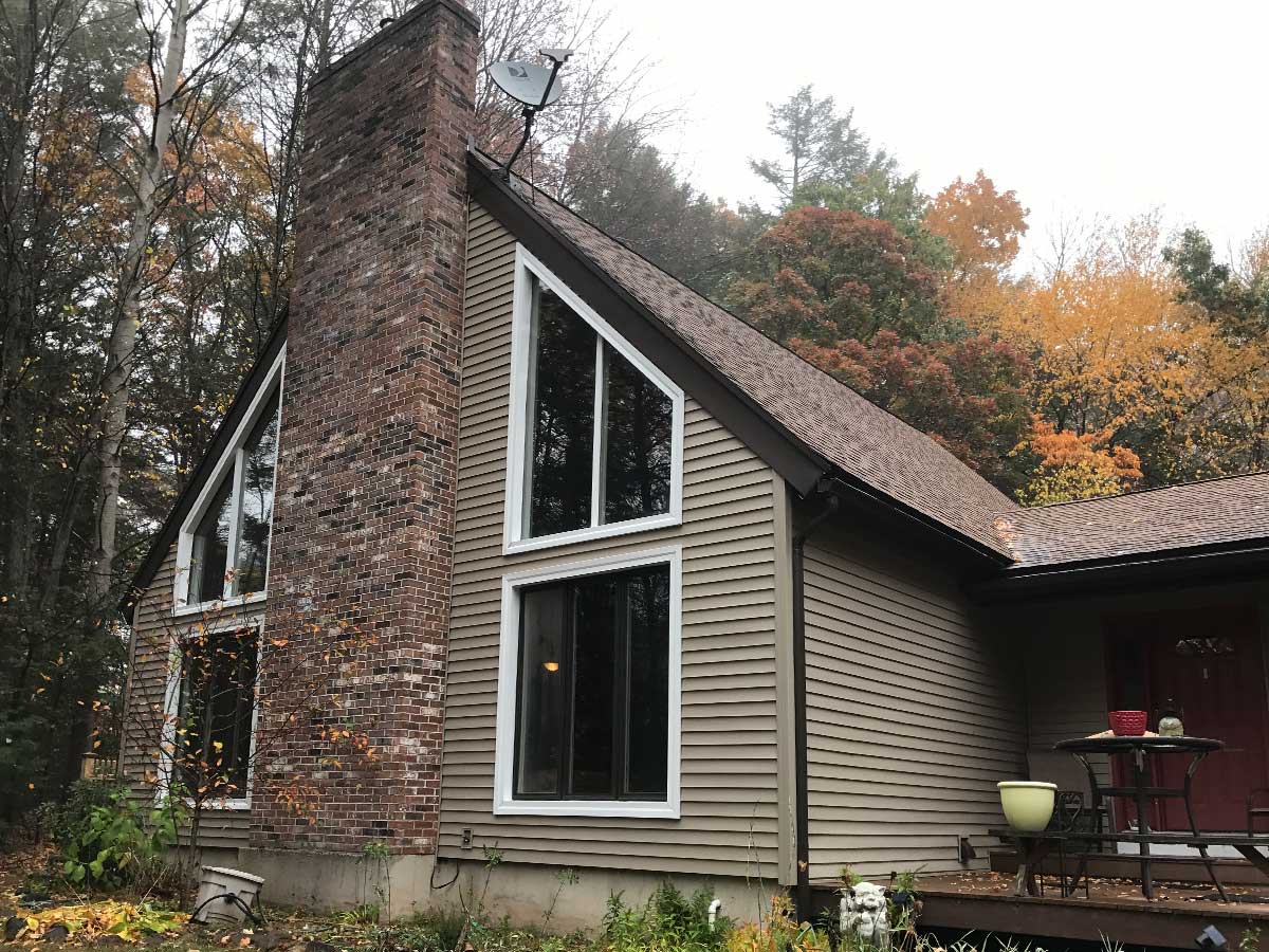 New vinyl siding installation on a Connecticut house — weather-resistant and maintenance-free